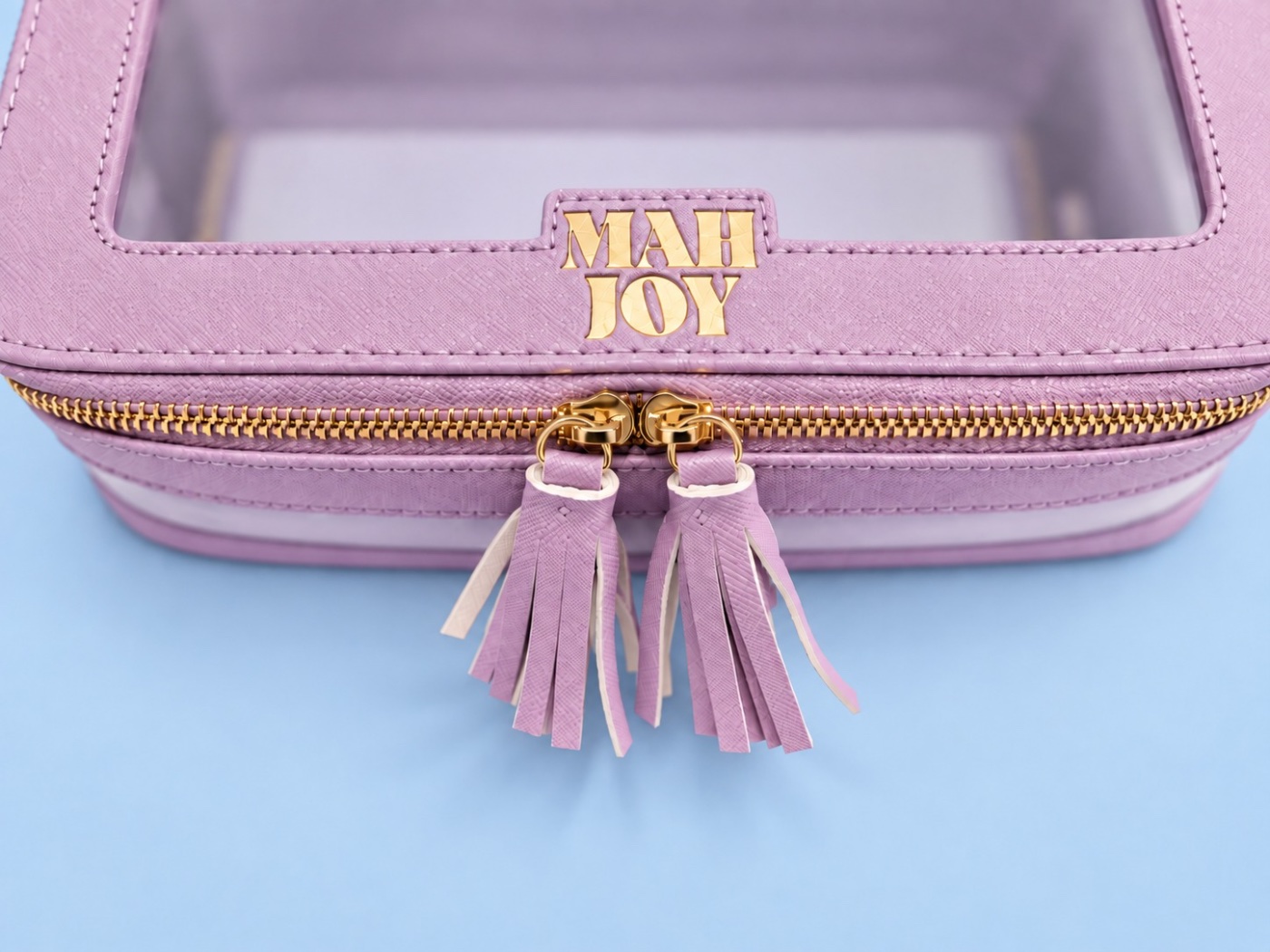 Mah Joy Tile Case in Lilac, gold zipper and tassels
