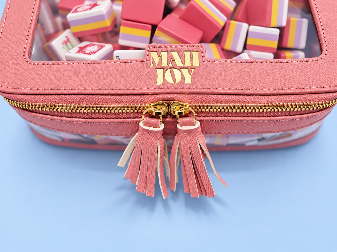 Mah Joy Tile Case in Pink, gold zipper and tassels
