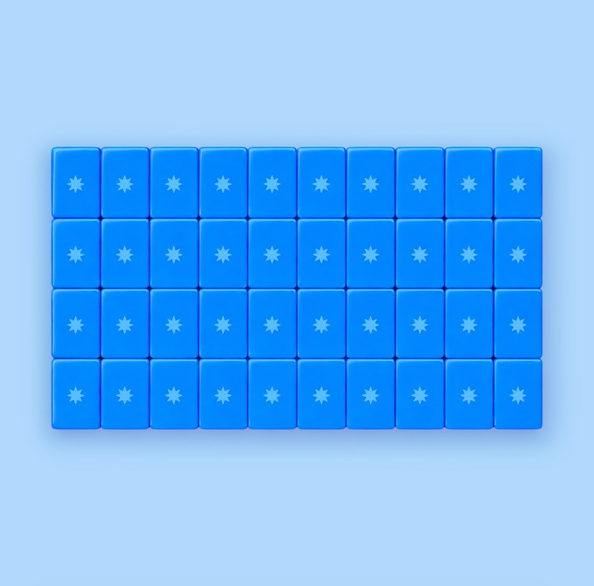 Blue star-printed backs of the Mythos tiles